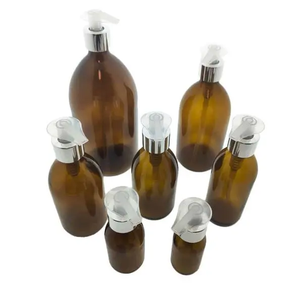 glazen fles amber bruin glas lotion zeeppomp zilver