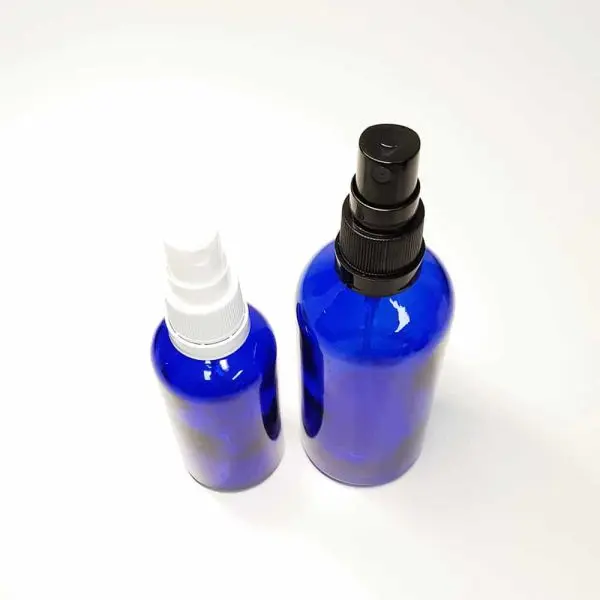 glazen spray fles blauw glas verstuiver